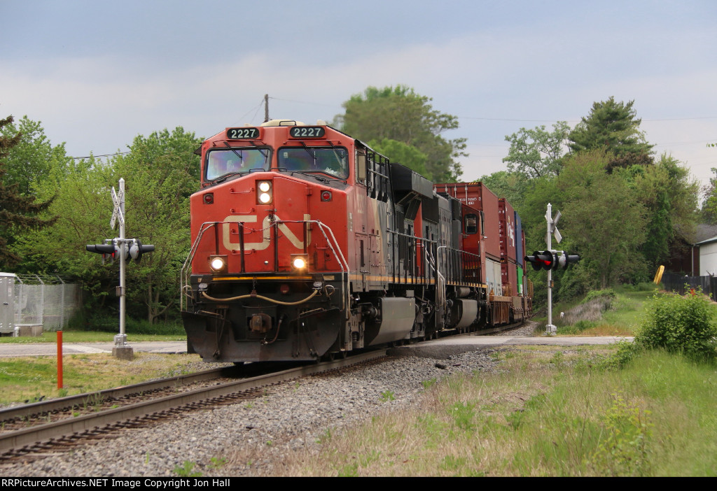 CN 2227 & 5648 work hard as they come up the hill with Q11691